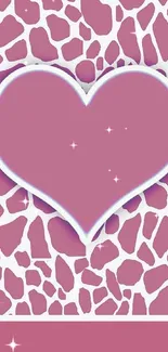 Pink heart pattern wallpaper with giraffe design.