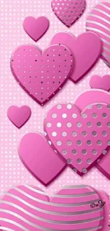 Mobile wallpaper with pink hearts, polka dots and stripes.