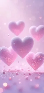 Pink hearts with sparkling effects on a pastel background.