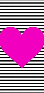 Pink heart on black and white striped background.