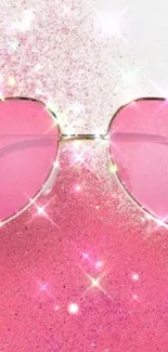 Pink glitter heart sunglasses with sparkles.