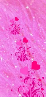 Dreamy pink wallpaper with swirling heart design.