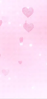 Pink wallpaper with hearts for mobile phones.