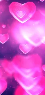 Bright pink hearts wallpaper for mobile devices.