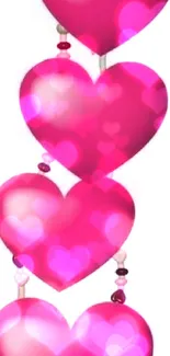 Cascading pink hearts on white background wallpaper.