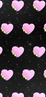 Digital wallpaper with pink hearts on a black starry background.