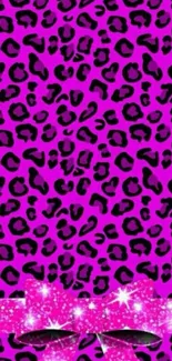 Pink leopard print background with a sparkling bow design.