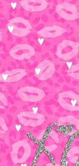 Pink wallpaper with lips, hearts, and glitter XO letters.