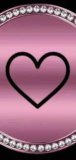 Pink heart with diamond border on black background.