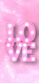 Pink wallpaper with neon 'LOVE' lights