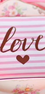 Pink striped wallpaper with 'love' and heart design.