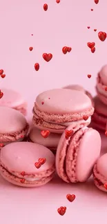 Pink macarons wallpaper with pastel tones.