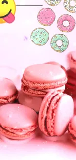 Pink macarons with cute donut illustrations.