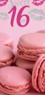 Pink macarons with Sweet 16 glitter accents perfect for celebratory theme.