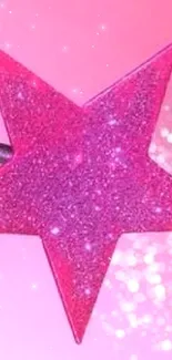 Pink magic star wand casting glitter on a soft pink background.