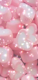 Heart-shaped pink marshmallows with sparkles.