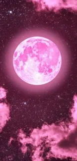 Pink moon illuminating a starry night sky with clouds.