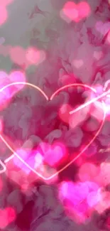 Pink neon heart with arrow through smoke on wallpaper.