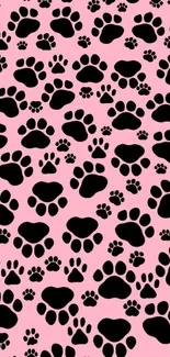 Pink background with black paw prints, perfect for pet lovers.