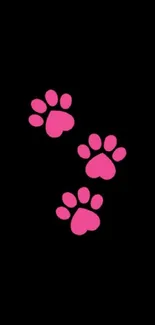 Black wallpaper with pink paw prints design.