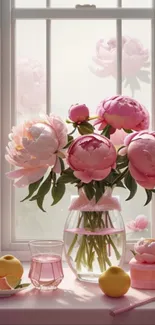 Beautiful pink peonies on a windowsill with fruit accents.