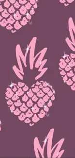 Pink heart-shaped pineapples on mauve background.