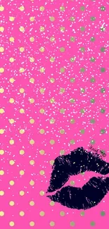 Pink wallpaper with yellow dots and a kiss print.