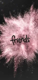 Pink powder explosion with 'friends' text on a dark background.