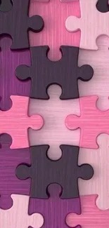 Pink and purple puzzle piece wallpaper for mobile.