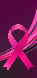 Vibrant pink ribbon on dark magenta background wallpaper.