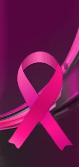 Vibrant pink ribbon wallpaper with magenta background.
