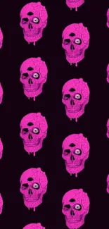 Vibrant pink skull pattern on a dark background, perfect for mobile wallpaper.