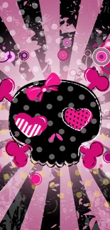 Retro pink skull wallpaper with polka dot patterns and bow details.