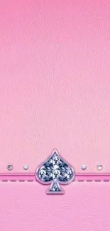 Pink spade wallpaper with rhinestone accents and leather texture.