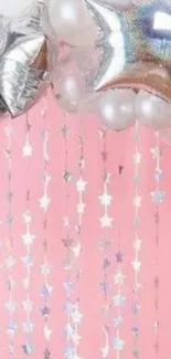 Pink wallpaper with shimmering star balloons and festive decorations.