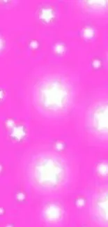 Vibrant pink wallpaper with sparkling stars.