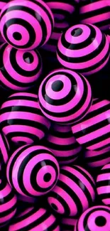 Vibrant pink and black striped 3D balls mobile wallpaper.