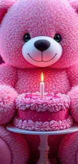 Adorable pink teddy bear with a birthday cake.