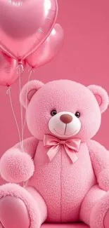 A pink teddy bear with heart-shaped balloons on a soft pink background.