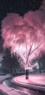 Glowing pink tree in snowy nighttime scene, perfect for mobile wallpaper.