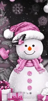 Pink winter snowman with festive decor and gifts on a mobile wallpaper.