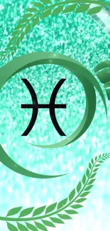 Pisces zodiac symbol on a teal, glittery background with green leafy elements.