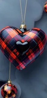 Plaid heart-shaped ornament on cloudy background.