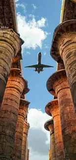 Jet flying over ancient temple pillars against a blue sky.