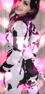 Woman in a cow print costume standing in a hallway, showcasing playful fashion.