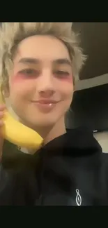 Person using banana as a phone humorously.