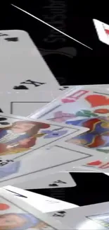 Mobile wallpaper of playing cards in dynamic motion design.