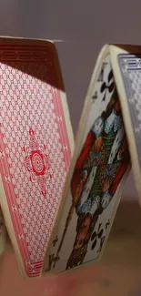 Playing cards in motion with dynamic design.