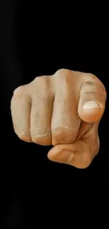 Pointing finger on a black background mobile wallpaper.