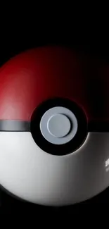 Sleek Pokeball image on a dark background for mobile wallpaper.